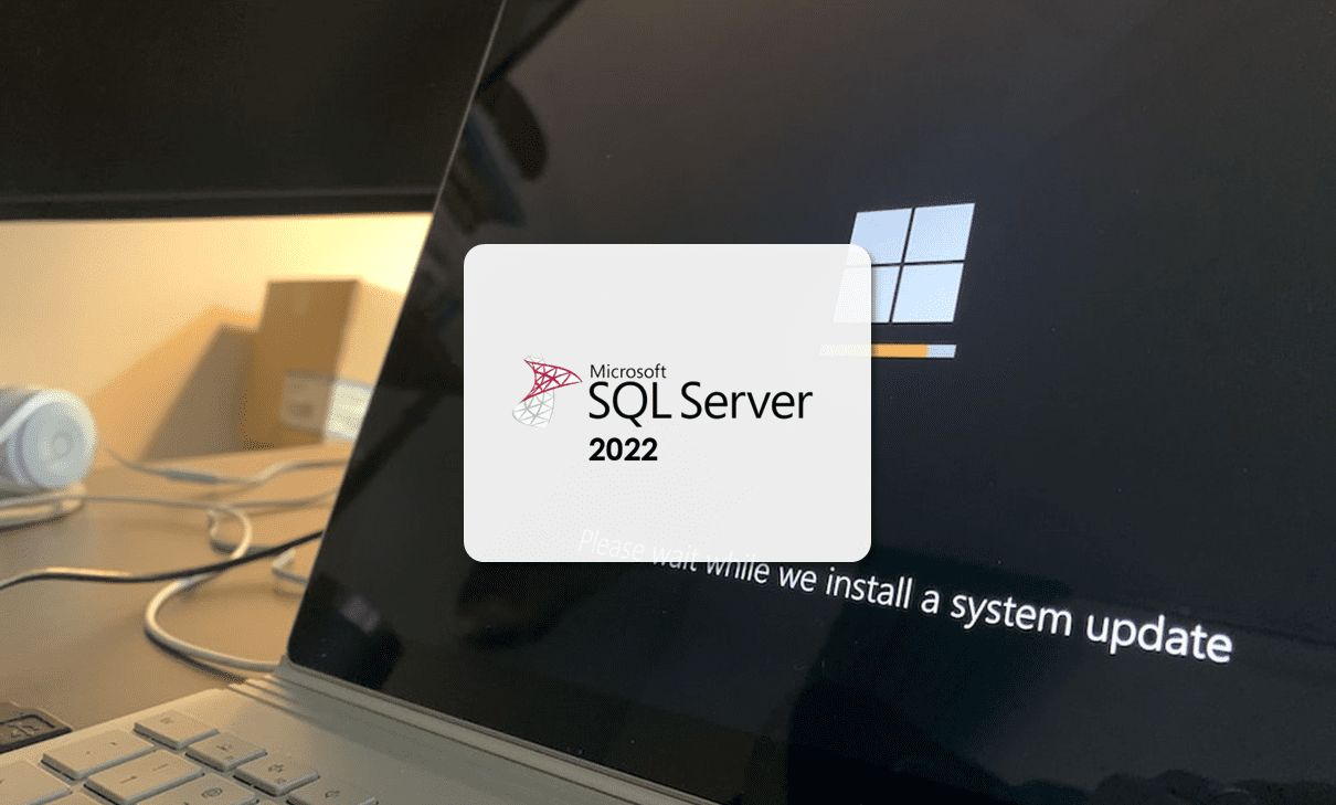 Logo SQL avec ordinateur de fond